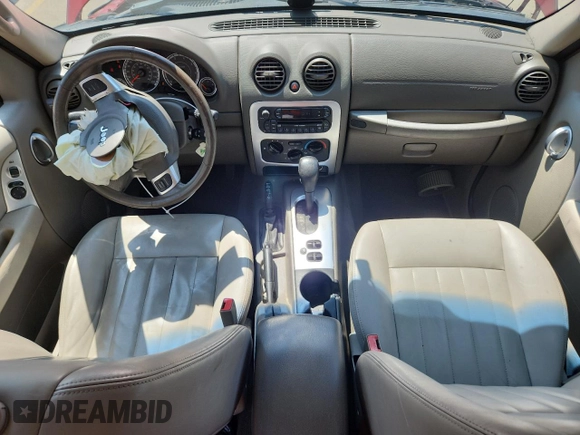 2007 Jeep Liberty Limited with VIN 1J4GL58K17W510903, listed as a Copart auction lot 59344515 with 186,217 mi miles and Salvage title. Bid and sale history available at DreamBid. Image 8.