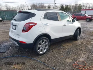 2017 Buick Encore Essence with VIN KL4CJGSB3HB014907, listed as a IAAI auction lot 41643044 with 64,769 mi miles and . Bid and sale history available at carsss.com. Image 4.