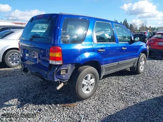 2006 Ford Escape XLS with VIN 1FMYU92Z36KC28266, listed as a IAAI auction lot 41744961 with 94,706 mi miles. Bid and sale history available at carsss.com. Image 4.