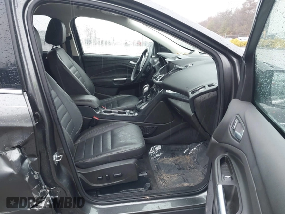 2015 Ford Escape Titanium with VIN 1FMCU9JX6FUB79093, listed as a IAAI auction lot 41805057 with 87,788 mi miles. Bid and sale history available at carsss.com. Image 5.
