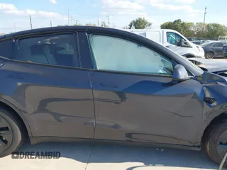 2024 Tesla Model Y Long Range with VIN 7SAYGDEE3RA321734, listed as a IAAI auction lot 40825378 with 4,440 mi miles and . Bid and sale history available at DreamBid. Image 13.