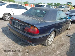 2001 BMW 3 Series 330Ci with VIN WBABS534X1EV86724, listed as a IAAI auction lot 42128593 with 153,296 mi miles. Bid and sale history available at carsss.com. Image 4.