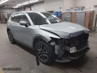 2018 Mazda CX-5 Grand Touring with VIN JM3KFBDM7J0316892, listed as a IAAI auction lot 41885705 with 90,386 mi miles. Bid and sale history available at carsss.com. Image 1.