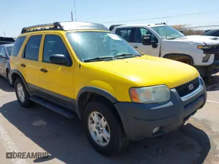 2003 Ford Escape XLT Popular 2 with VIN 1FMCU93143KC88233, listed as a IAAI auction lot 41929404 with 225,946 mi miles. Bid and sale history available at carsss.com. Image 1.