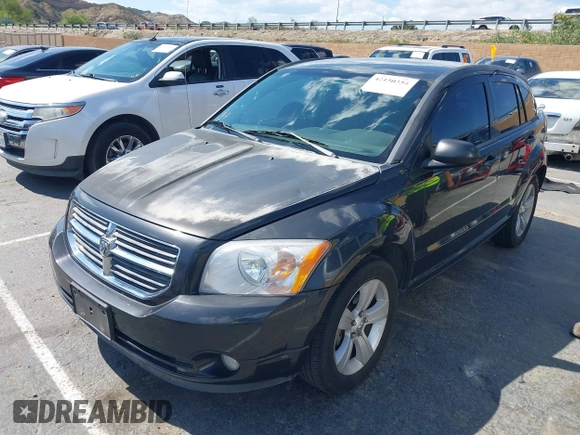 2011 Dodge Caliber Mainstreet with VIN 1B3CB3HA9BD120950, listed as a IAAI auction lot 42150354 with 103,015 mi miles. Bid and sale history available at carsss.com. Image 2.