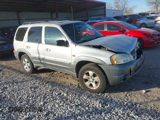 2002 Mazda Tribute LX with VIN 4F2CU081X2KM34920, listed as a IAAI auction lot 41051233 with 256,335 mi miles and . Bid and sale history available at carsss.com. Image 1.