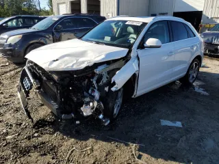 2015 Audi Q3 Premium Plus z VIN WA1BFCFS7FR014199, wystawiony jako Copart lot #81987154 z przebiegiem 62 071 mil mil oraz Szkoda całkowita • Salvage title. Historia ofert i sprzedaży dostępna na DreamBid. Obrazek 1.