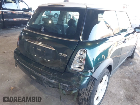 2002 MINI Hardtop with VIN WMWRC33472TC34913, listed as a IAAI auction lot 41599382 with 150,177 mi miles and . Bid and sale history available at DreamBid. Image 6.