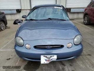 1999 Ford Taurus LX with VIN 1FAFP52UXXA159704, listed as a Copart auction lot 52350774 with 112,562 mi miles and Salvage Title. Bid and sale history available at carsss.com. Image 5.