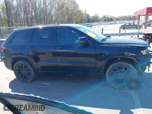 2017 Jeep Grand Cherokee Altitude with VIN 1C4RJEAG2HC880691, listed as a IAAI auction lot 41892221 with 116,008 mi miles and . Bid and sale history available at DreamBid. Image 14.