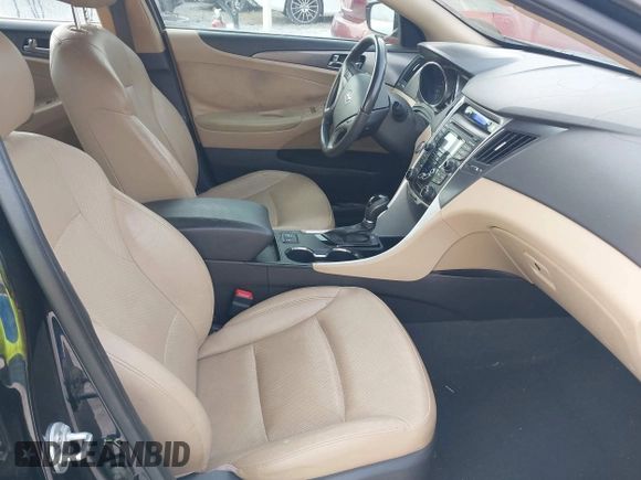 2012 Hyundai Sonata Hybrid with VIN KMHEC4A41CA054312, listed as a IAAI auction lot 42124397 with 49,581 mi miles and . Bid and sale history available at DreamBid. Image 5.