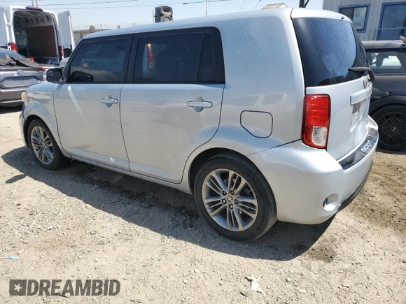 2013 Scion xB with VIN JTLZE4FE5DJ039321, listed as a Copart auction lot 52744485 with 128,536 mi miles and Salvage Title. Bid and sale history available at carsss.com. Image 2.