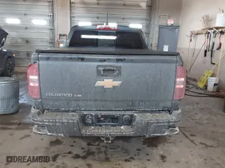 2019 Chevrolet Colorado 4WD Z71 with VIN 1GCGTDEN9K1299292, listed as a IAAI auction lot 41626944 with 84,949 mi miles. Bid and sale history available at carsss.com. Image 16.