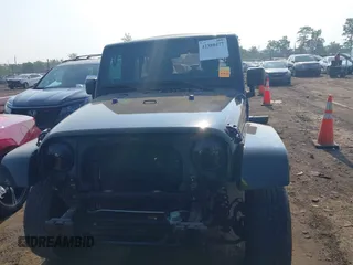 2014 Jeep Wrangler Unlimited Sahara with VIN 1C4BJWEG6EL217945, listed as a IAAI auction lot 42388477 with 61,739 mi miles and . Bid and sale history available at DreamBid. Image 13.