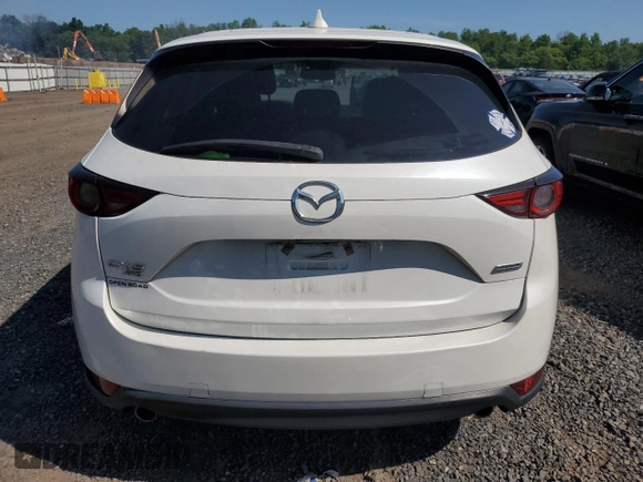 2019 Mazda CX-5 Grand Touring with VIN JM3KFBDM2K1663140, listed as a Copart auction lot 61713755 with 68,101 mi miles and Salvage title. Bid and sale history available at DreamBid. Image 6.