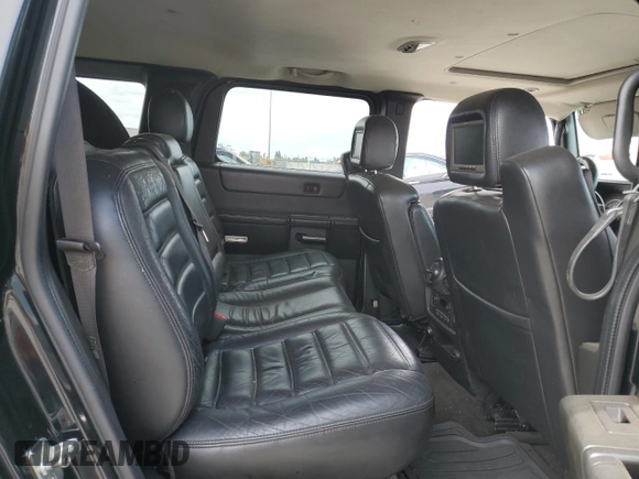2005 Hummer H2 SUV with VIN 5GRGN23UX5H115383, listed as a Copart auction lot 71682984 with 157,405 mi miles and Salvage Title. Bid and sale history available at carsss.com. Image 11.