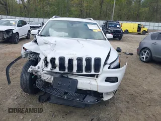 2016 Jeep Cherokee Latitude with VIN 1C4PJMCS5GW148829, listed as a IAAI auction lot 41964335 with 99,741 mi miles. Bid and sale history available at carsss.com. Image 12.