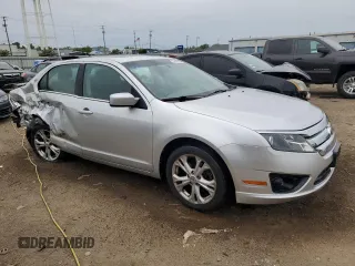 2012 Ford Fusion SE with VIN 3FAHP0HA6CR104918, listed as a Copart auction lot 57497295 with 177,017 mi miles and Salvage title. Bid and sale history available at DreamBid. Image 4.
