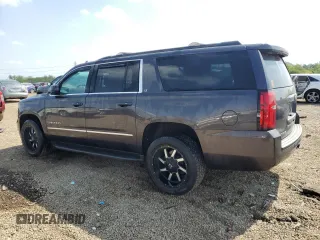 2016 Chevrolet Suburban LT z VIN 1GNSKHKC1GR198058, wystawiony jako Copart lot #56909335 z przebiegiem 150 907 mil mil oraz Szkoda całkowita • Salvage title. Historia ofert i sprzedaży dostępna na DreamBid. Obrazek 2.