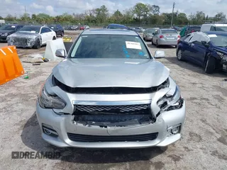 2014 Infiniti Q50 Premium z VIN JN1BV7AP9EM690381, wystawiony jako IAAI lot #41761562 z przebiegiem 107 099 mil mil oraz . Historia ofert i sprzedaży dostępna na DreamBid. Obrazek 12.