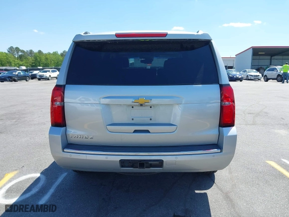 2015 Chevrolet Tahoe LTZ with VIN 1GNSCCKC3FR202934, listed as a IAAI auction lot 41995474 with 258,186 mi miles. Bid and sale history available at carsss.com. Image 16.