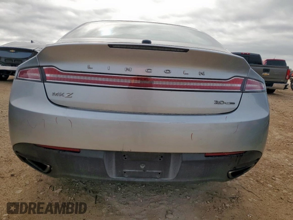 2014 Lincoln MKZ z VIN 3LN6L2G90ER815819, wystawiony jako Copart lot #61189515 z przebiegiem 101 148 mil mil oraz Szkoda całkowita • Salvage title. Historia ofert i sprzedaży dostępna na DreamBid. Obrazek 6.