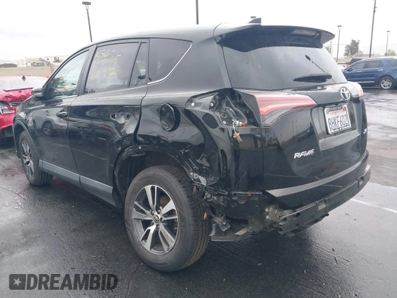 2018 Toyota RAV4 XLE with VIN 2T3WFREV3JW516867, listed as a IAAI auction lot 41765369 with 54,390 mi miles. Bid and sale history available at carsss.com. Image 3.