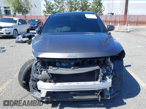 2020 Jeep Compass Altitude with VIN 3C4NJCBB0LT134047, listed as a IAAI auction lot 41806348 with 70,533 mi miles and . Bid and sale history available at carsss.com. Image 13.