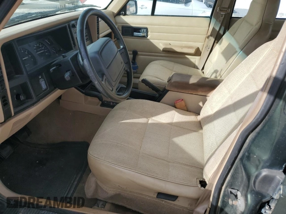 1996 Jeep Cherokee SE z VIN 1J4FJ28S9TL211073, wystawiony jako Copart lot #78052574 z przebiegiem 174 967 mil mil oraz Nie do naprawy • Non repairable. Historia ofert i sprzedaży dostępna na DreamBid. Obrazek 7.