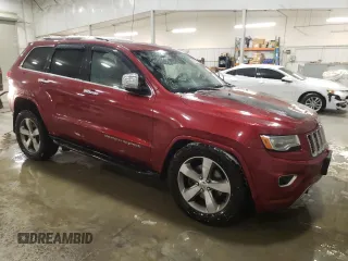 2014 Jeep Grand Cherokee Overland with VIN 1C4RJFCM3EC362173, listed as a Copart auction lot 43619775 with 277,053 mi miles and Salvage Title. Bid and sale history available at DreamBid. Image 4.