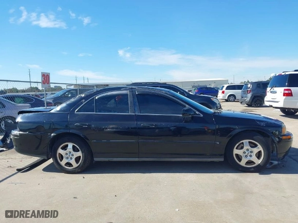 2000 Lincoln LS with VIN 1LNHM86S4YY818127, listed as a IAAI auction lot 41329978 with 158,134 mi miles. Bid and sale history available at carsss.com. Image 14.
