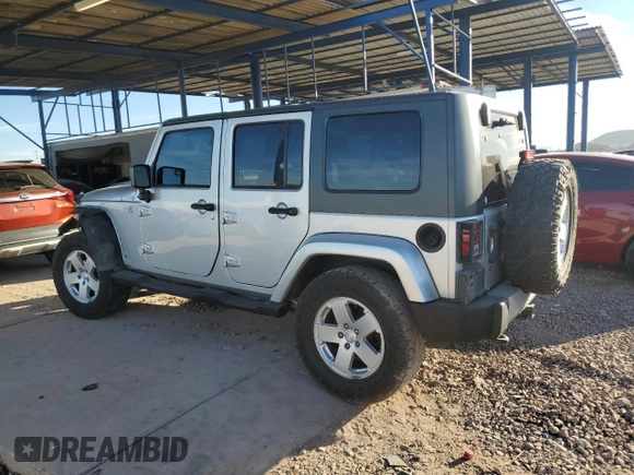 2010 Jeep Wrangler Unlimited Sahara with VIN 1J4HA5H13AL184449, listed as a Copart auction lot 43421945 with 176,725 mi miles and Salvage Title. Bid and sale history available at carsss.com. Image 2.