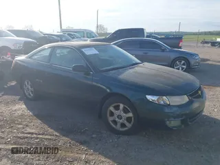 1999 Toyota Solara SE with VIN 2T1CF22P0XC126036, listed as a IAAI auction lot 42042257 with 148,422 mi miles. Bid and sale history available at carsss.com. Image 1.