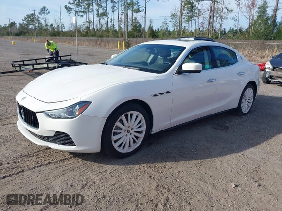 2015 Maserati Ghibli with VIN ZAM57XSA6F1156252, listed as a IAAI auction lot 41530186 with 84,417 mi miles and . Bid and sale history available at DreamBid. Image 2.