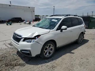 2018 Subaru Forester Touring with VIN JF2SJAWC4JH435749, listed as a Copart auction lot 63526465 with 143,029 mi miles and Salvage title. Bid and sale history available at DreamBid. Image 1.