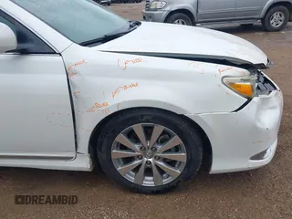 2011 Toyota Avalon with VIN 4T1BK3DB1BU405730, listed as a IAAI auction lot 41895757 with 214,655 mi miles and . Bid and sale history available at carsss.com. Image 18.