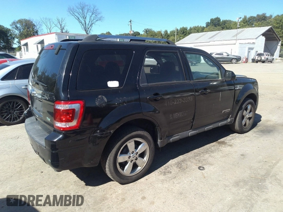2010 Ford Escape Limited with VIN 1FMCU9EG5AKB06876, listed as a IAAI auction lot 40505932 with 143,259 mi miles and . Bid and sale history available at DreamBid. Image 4.