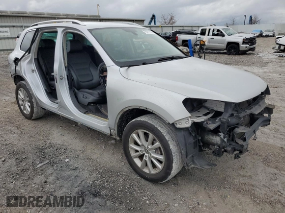 2013 Volkswagen Touareg Lux with VIN WVGEF9BPXDD004537, listed as a Copart auction lot 79277734 with 105,091 mi miles and Salvage Title. Bid and sale history available at DreamBid. Image 4.