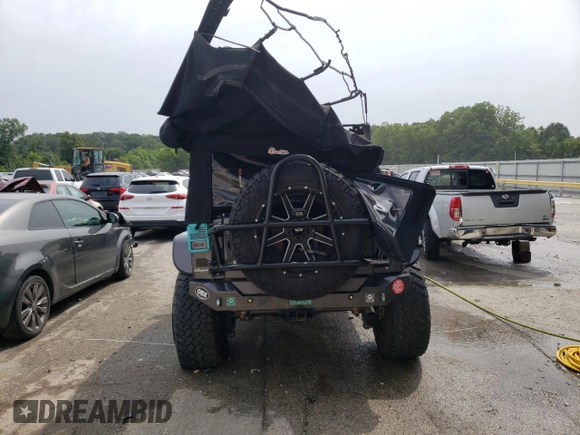 2016 Jeep Wrangler Unlimited Rubicon Hard Rock with VIN 1C4BJWFG4GL188382, listed as a Copart auction lot 60615403 with 39,629 mi miles and Salvage Title. Bid and sale history available at carsss.com. Image 6.