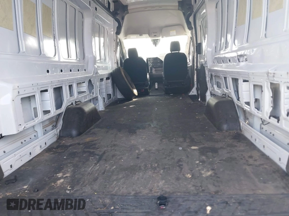 2022 Ford Transit Cargo z VIN 1FTBW3X81NKA04543, wystawiony jako IAAI lot #41763336 z przebiegiem 128 518 mil mil oraz . Historia ofert i sprzedaży dostępna na DreamBid. Obrazek 8.