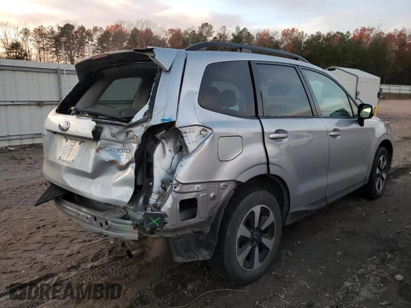 2018 Subaru Forester Premium with VIN JF2SJAGC2JH498962, listed as a Copart auction lot 69431912 with 90,664 mi miles and . Bid and sale history available at DreamBid. Image 3.