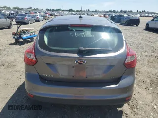 2014 Ford Focus SE z VIN 1FADP3K24EL317353, wystawiony jako Copart lot #57181215 z przebiegiem 144 495 mil mil oraz Szkoda całkowita • Salvage title. Historia ofert i sprzedaży dostępna na DreamBid. Obrazek 6.