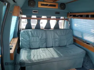 1995 GMC Safari z VIN 1GDDM19W2SB525888, wystawiony jako Copart lot #81358954 z przebiegiem 121 066 mil mil oraz Szkody całkowita. Historia ofert i sprzedaży dostępna na DreamBid. Obrazek 11.
