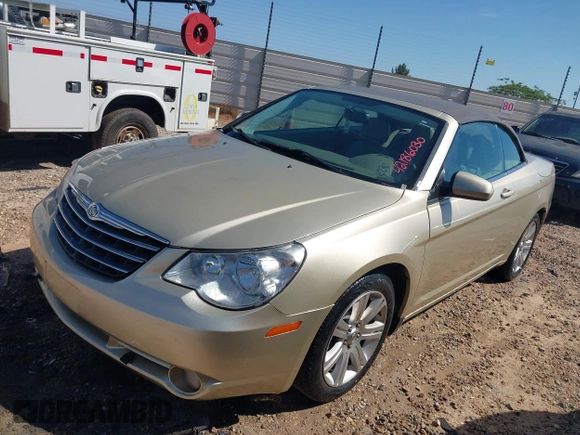 2010 Chrysler Sebring Touring z VIN 1C3BC5ED3AN172492, wystawiony jako IAAI lot #42186030 z przebiegiem 203 041 mil mil oraz . Historia ofert i sprzedaży dostępna na DreamBid. Obrazek 2.