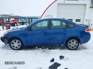 2008 Ford Focus SE with VIN 1FAHP35N58W185875, listed as a IAAI auction lot 41569411 with 185,579 mi miles. Bid and sale history available at carsss.com. Image 15.