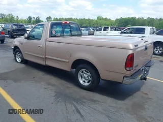 1997 Ford F-150 with VIN 1FTDF17W9VNA84250, listed as a IAAI auction lot 42149320 with 85,297 mi miles and . Bid and sale history available at DreamBid. Image 3.