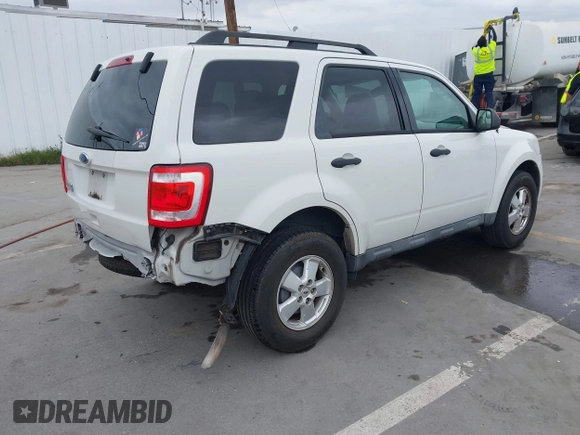 2011 Ford Escape XLT with VIN 1FMCU0D79BKA38578, listed as a IAAI auction lot 41895971 with 223,689 mi miles. Bid and sale history available at carsss.com. Image 4.