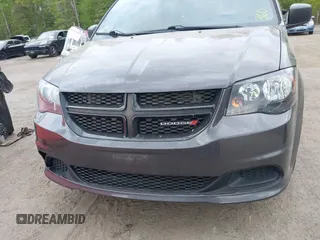 2015 Dodge Grand Caravan American Value with VIN 2C4RDGBG2FR542844, listed as a IAAI auction lot 42109983 with 129,718 mi miles and . Bid and sale history available at DreamBid. Image 12.