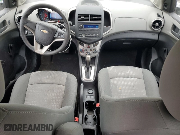 2015 Chevrolet Sonic LS with VIN 1G1JA5SH4F4165108, listed as a Copart auction lot 57299985 with 117,669 mi miles and Clean title. Bid and sale history available at DreamBid. Image 8.