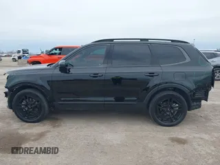 2024 Kia Telluride EX X-Line z VIN 5XYP3DGC5RG473610, wystawiony jako IAAI lot #41360858 z przebiegiem 13 825 mil mil oraz . Historia ofert i sprzedaży dostępna na DreamBid. Obrazek 15.